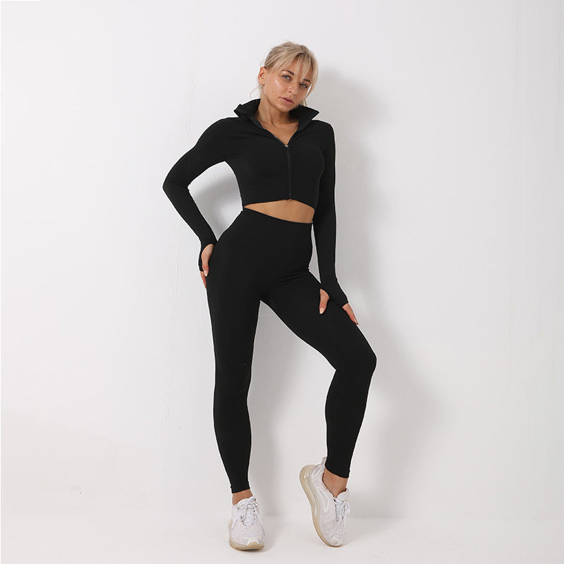 Women’s seamless fitness set with high-waisted sculpting leggings and long sleeve zip top.
